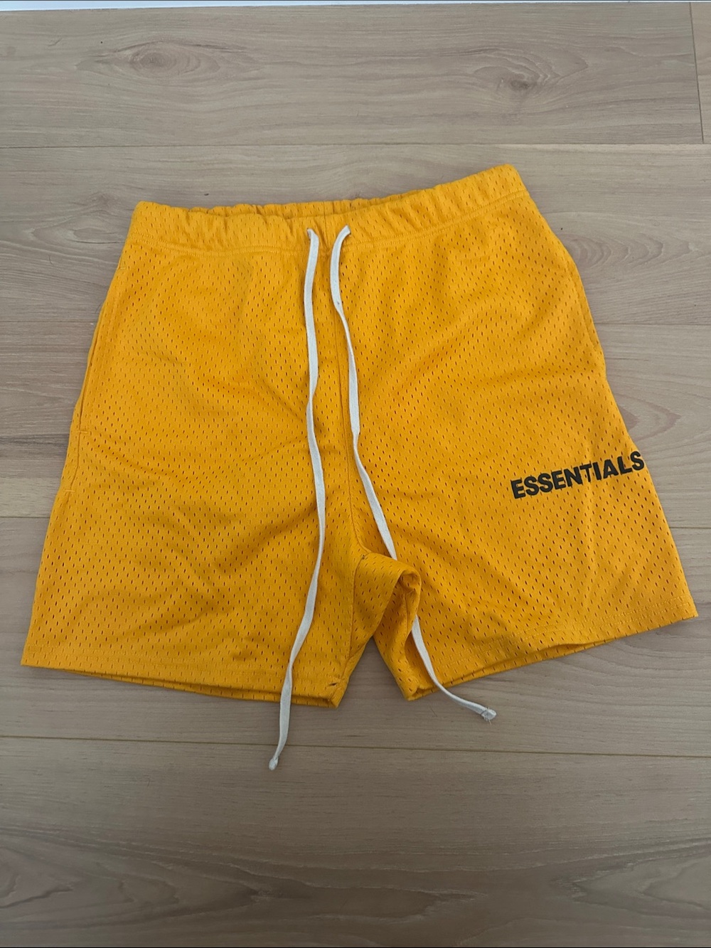 ESSENTIALS Men's Yellow Mesh Athletic Shorts with White Drawstring